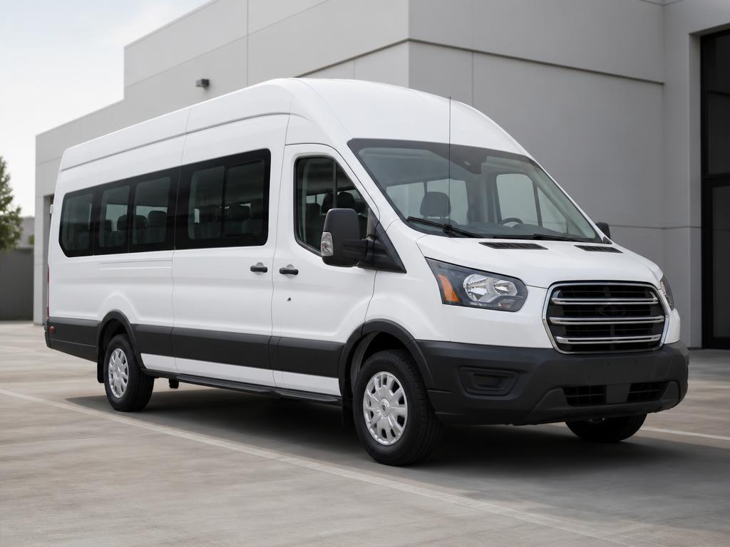 White Ford Transit 15-passenger van parked outside a conference centre